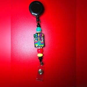 Badge reel neon crayons with concho
